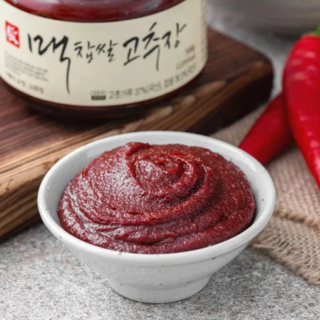 Traditional red pepper paste aged in pottery, made with locally sourced red pepper powder, glutinous rice powder, and soybean powder. Features a rich umami flavour with a balanced blend of heat and sweetness.