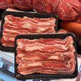 Premium Spanish chestnut-fed Duroc pork belly with tender texture, perfect for grilling or slow cooking